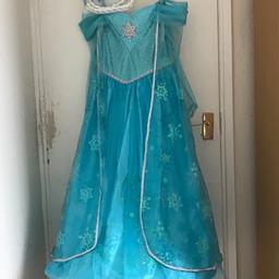 Worn once for a photoshoot but it was too long for her so the hem got ruined, see pictures. Other than that is in good condition. The hair accessories have not been used 9-10 years