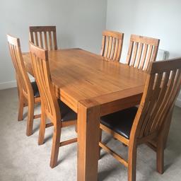 Large dining table with 6 Faux Leather Chairs. 4 chairs are in good condition however 2 have slight wear and tear.
Height 75cm
Width 1 Metre
Length 178cm