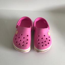 Girls pink crocs shoes size 8. 
Used but in good condition. 
Collection from Gu14dp.