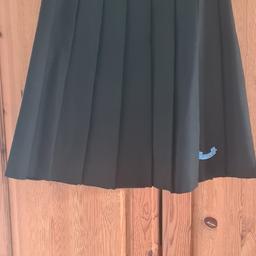 Two brand new black school skirts
 never worn.  Size Waist 24 Length 22

£15 each