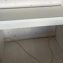 IKEA malm dressing table with glass top

Small scratch on top and mark on front of left leg