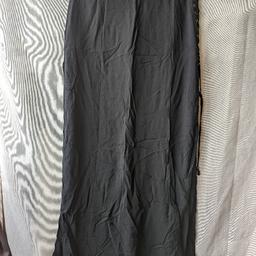 Forever 21 long black skirt maxi double split with crossed details. It comes with a shorter layer underneath. 100% rayon, not stretchy. Worn once, basically brand new.
