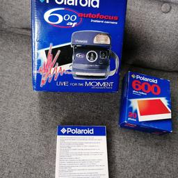 Polaroid 600af instant  camera with photo paper working order please see photos for condition sold as seen in listing