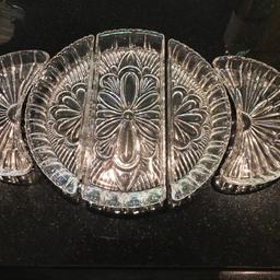 Vintage Pressed Glass Dressing Centre Piece dishes side servers hors d'oeuvres. 
Stunning vintage glass, very unusual, it belonged to my great Aunt,
Could be used as a centre piece, serving dishes or on a dressing table for trinkets
In good vintage condition 
Consists of 5 pieces
I have placed a bottle of wine next to it to give an idea of scale 
Viewing welcome