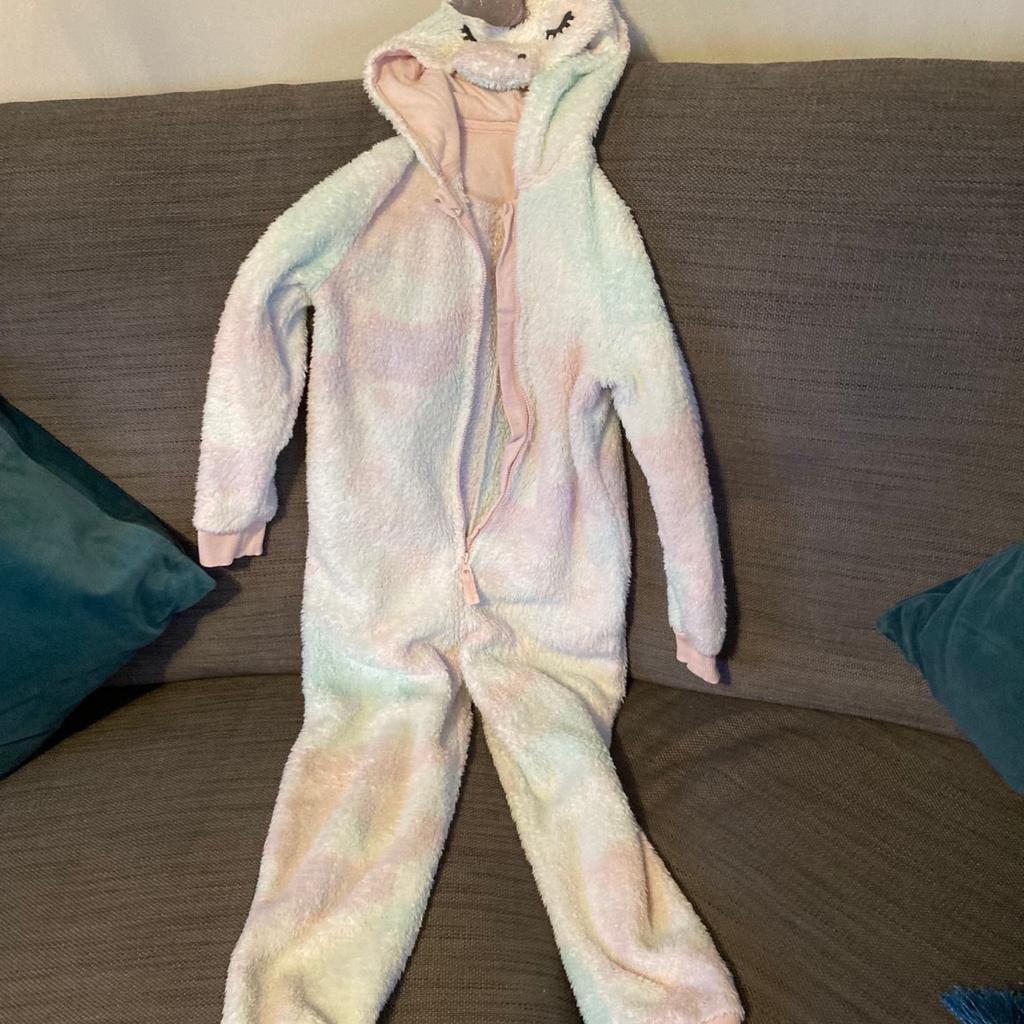 Sparkly onesie with Unicorn design hood
From m and s
Size 7/8 yrs
As new hardly worn condition
From pet and smoke free home
