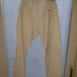 Mens Armani j21 white cotton and linen mix jeans trousers button fly gold cloth plate silver wings four pockets used with some marks from somewhere who knows. They may wash out but otherwise clean. 36 inch waist
Length 100cm waist across 46cm  waist to crotch 26cm straight leg
Paid £165 for them  back then
All used  items inspected dry cleaned and ironed
Prices negotiable sensible offers only please

Dead stock dread stock
100% genuine All excluey get busy dripping or get busy drying!!!,