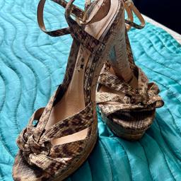 Leather animal print wedge shoes- 5inch heel - buckle strap fastening-good condition
Size 39 (UK 6.)
Buyer must collect -Stourbridge