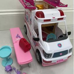 This is a Barbie Ambulance with accessories, sounds and lights.