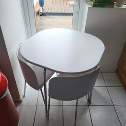 white space saving table and chairs.comes from a pet and smoke free home, collection only