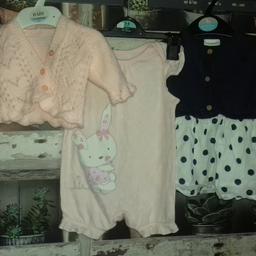 THIS IS FOR A BUNDLE OF GIRLS CLOTHES

1 X HAND MADE CARDIGAN - BRAND NEW
1 X PINK ALL IN ONE WITH WHITE SPOTS AND RABBIT THEM - USED
1 X NAVY DRESS FROM NEXT - USED

PLEASE SEE PHOTO