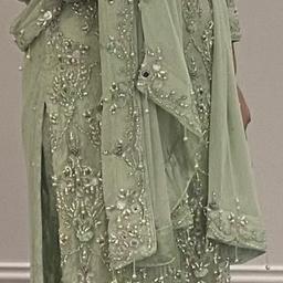 Only worn few hours
Mint green
Purchased unstitched £225
And paid £45 to get it stitched as of the stone work
Kamiz is long style
With banasri lining
The trousers also banasri with attached lining
Comes with a scarf
The suit is heavy
Zoom into Picts for more detail
No silly offers