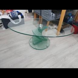 Solid glass coffee table in very good condition.
A few small surface scratches due to general usage. (Quite heavy)