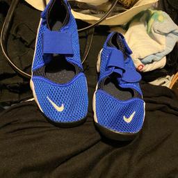 Blue Nike rift size 5 never been used from a pet and smoke free home. Very comfortable to wear.
