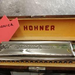 Hohner harmonica
The 64 chromonica, 4 chromatic octaves, professional model, immaculate in original case and in super condition