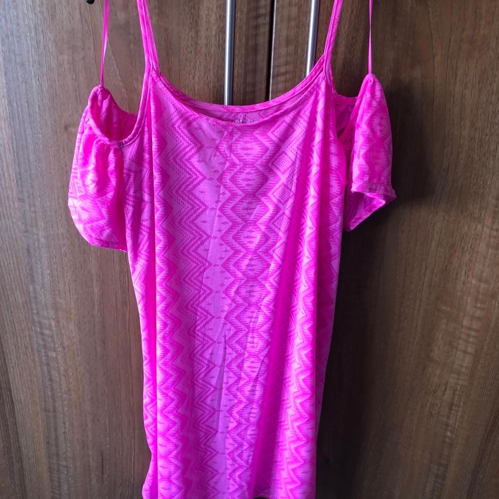 Never been worn, very soft material, thin material, perfect for over the bikini