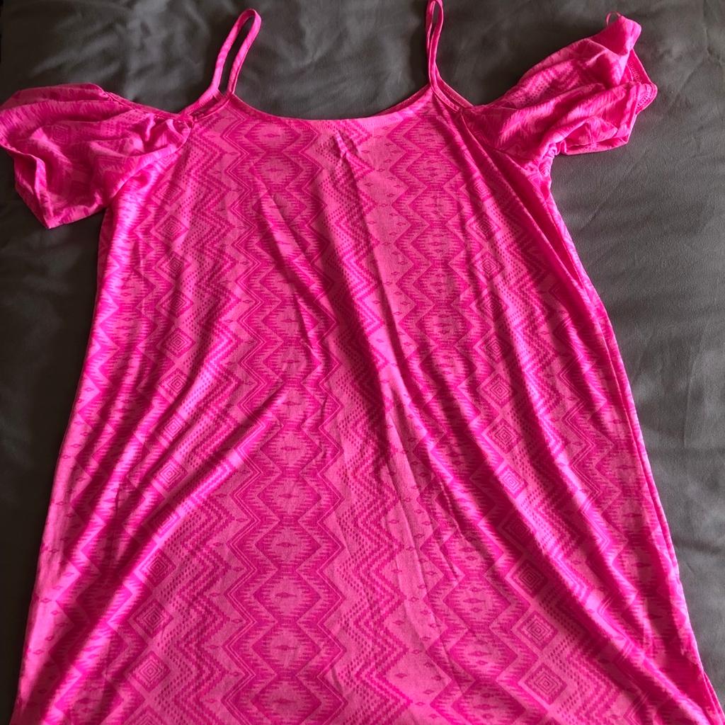 Never been worn, very soft material, thin material, perfect for over the bikini