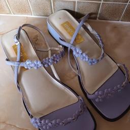 LOVELY SANDLES JUST BEEN TRIED ON. THE SANDLES ARE FINISHED WITH DIAMANTES AROUND THE STRAPS.