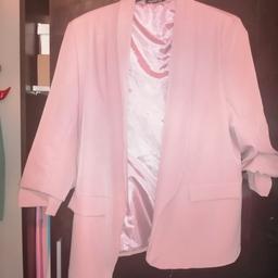 Pink/Peach color jacket. Has rolled up sleeve detail on the sleeves. Bought from Boohoo. Excellent condition, worn once.
