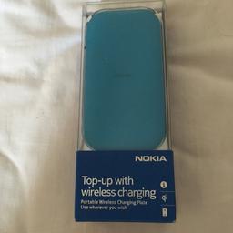 Nokia portable wireless charging plate to use wherever you like, blue in colour used minimal times so in clean condition