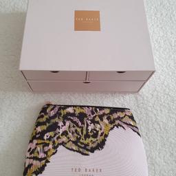 Ted Baker empty box without cosmetics but it comes with make up bag never used.