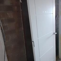 White,Heavy duty fire door. Ladder design with 3 hinges and door handle. Great solid door no longer needed. £30 ONO . All offers considered, can deliver locally.