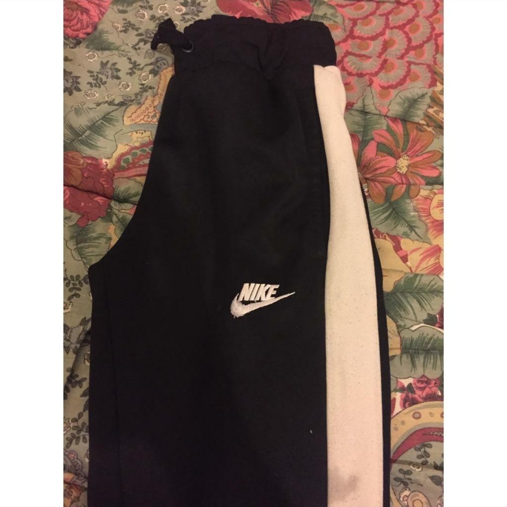 Hello I am selling this Nike tracksuit. Size is 12-13 years old. Used for a couple of days but is small for me now. Has a minor black stain on the pants but no problem with that and a little iron stain on the front side of the pants but can’t see much of it so that’s great. If bought then no return or exchange accepted. Thank you😃