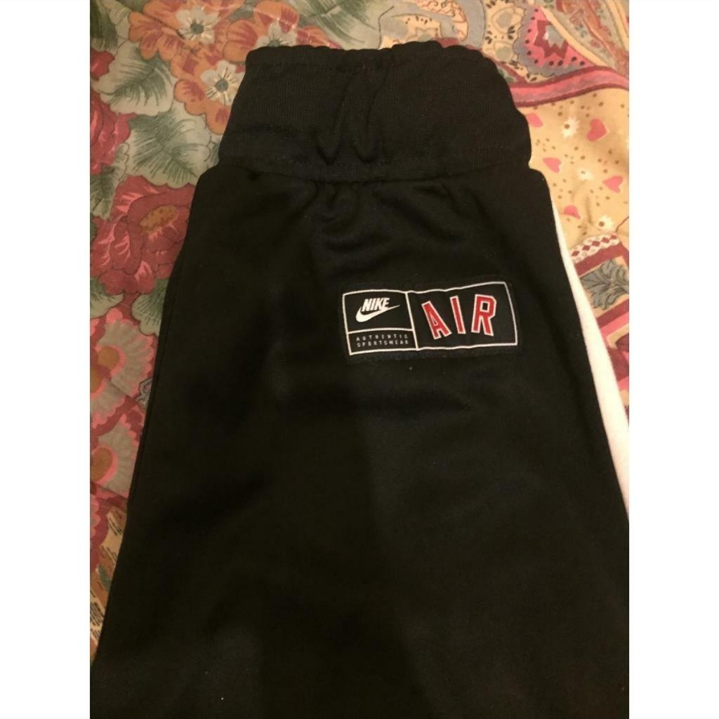 Hello I am selling this Nike tracksuit. Size is 12-13 years old. Used for a couple of days but is small for me now. Has a minor black stain on the pants but no problem with that and a little iron stain on the front side of the pants but can’t see much of it so that’s great. If bought then no return or exchange accepted. Thank you😃