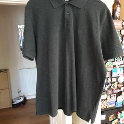 HUGO BOSS POLO SHIRT
DARK GREY 
XXL
EXCELLENT CONDITION 
ONLY WORN TWICE 
70 POUNDS WHEN NEW 
TO BIG FOR ME NOW