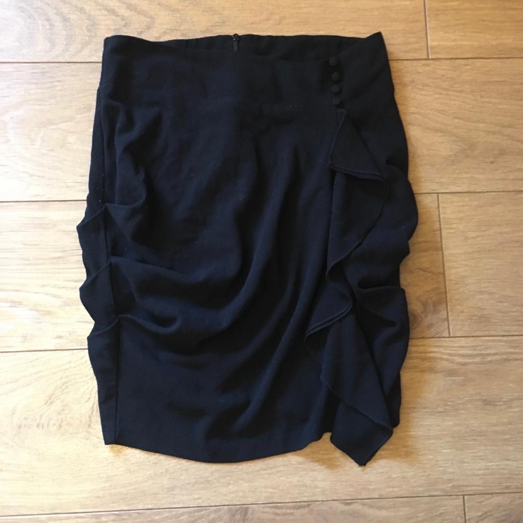Lovely black waterfall skirt from miss Selfridge

Size 12