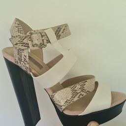 black white and beige snakeskin effect heels
size 5 
very good condition