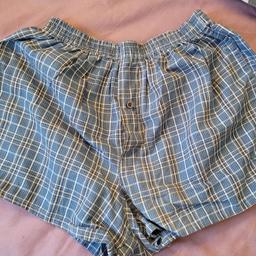 boys checked boxers. faded label but approx 13 years, 24 inch waist. Good condition.