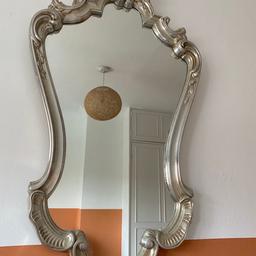 Victorian style mirror with silver/pearlescent frame. In perfect condition.
Bought from a local independent glass shop.
80 x 46cm. Collection only.