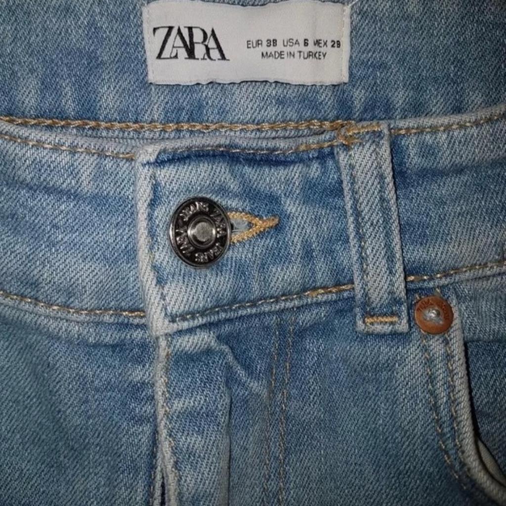 Pantaloni/ jeans strappati, marca Zara, colore azzurro, tg.40, buoni condizioni.