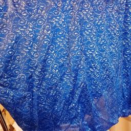 Blue fabric with silver thread. 15 metres or more.. On 150cm.