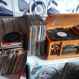 record player ucan play records tapes and cds on 100 large records from meatloaf waylon Jennings dolly Parton/1 iron maiden Johnny cash Dubliners meatloaf and lots of older music and over 30 singles having a clear out55 pound   thanks for looking