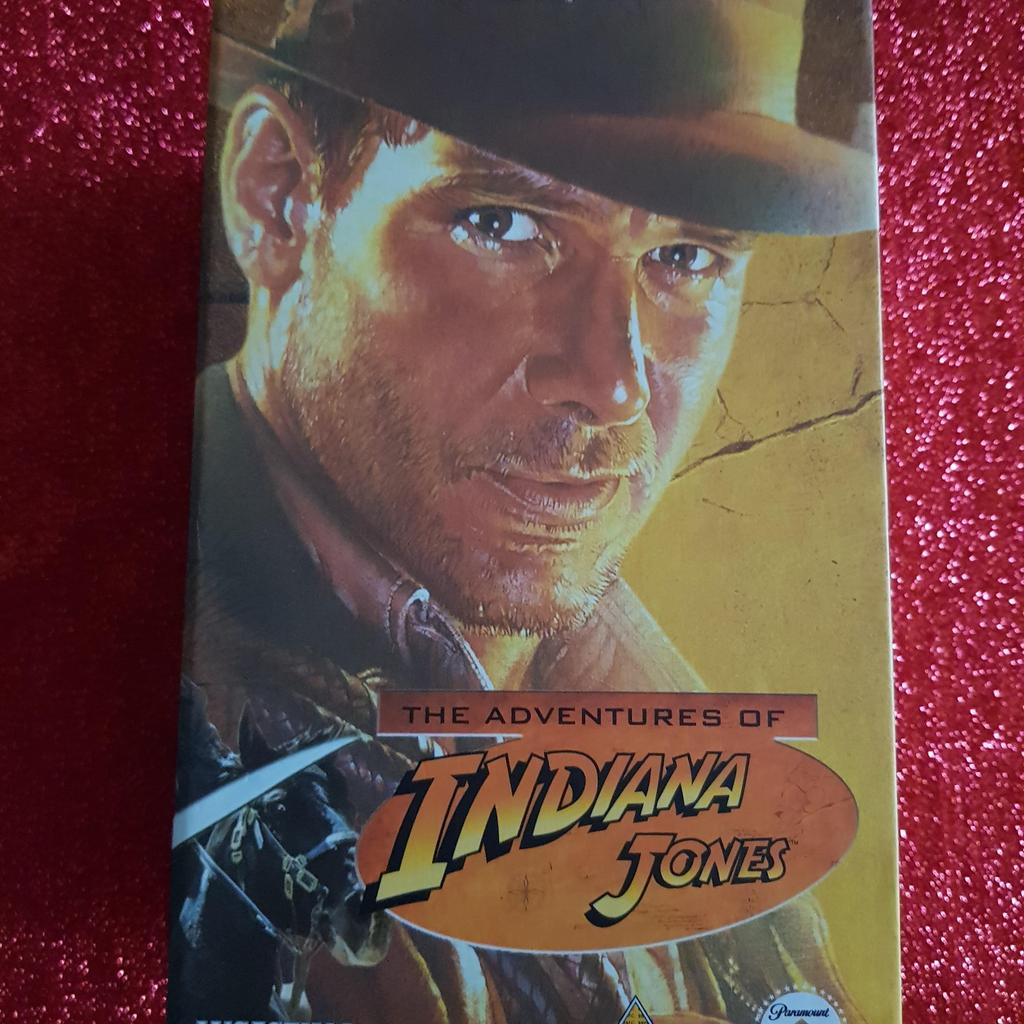 The Adventures of Indiana Jones VHS boxset issued by Lucasfilm in 2000. Includes The Temple of Doom, Raiders of the Lost Ark, and The Last Crusade. All videos play fine and box and cases all in good condition. As well as free collection from us, we also offer UK postal delivery for £2.99.