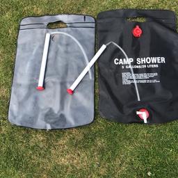 2 camp showers . You fill them up and leave in the sun to warm up. Bargain £6 for the pair.Then hang up and shower!! 
Please see my other items. Thanks for looking .