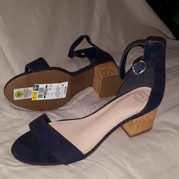 Brand new size 6 wide fit. Navy blue with ankle strap fastening. Small 1 inch block Insolita heel. (All materials and manufacturing Vegan friendly) Summer comfort guaranteed.  

original price £19.50