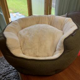 stunning dark khaki luxury ped bed, for a dog or cat.Has new I brought for our cat and he don't use.Removable inner cushion machine washable.I paid £45 new.