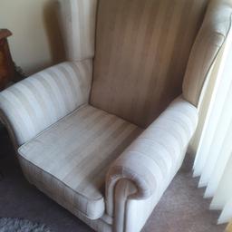 Two wing back armchairs in very good used condition.I say used condition but are in back room so not used very often.Light and dark cream stripe From non smoking household.Thanks for looking.