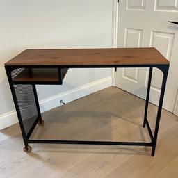 This is the laptop table from IKEA with wheels.

Dimension 100cm X 36cm X 75cm
Originally £60 from IKEA but selling it for £20 due to some scratches as in the photos.
Overall still in very good condition and stable.

Collection only in W1D 6LY
Get in touch with any questions.