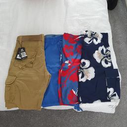 im selling 4 pairs mens shorts pic 2 size 34w, pic 3 size 33to 36, pic4 size 32 waist, pic 5 size 32 excellent condition £10 for the 4