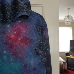Spectacular astral sweatshirt/ hoodie see photos and info provided. It in used with flaws condition but with lots of life left in it. It a boys large size but I think it would suits girls also. Any questions please ask and I will answer asap. It's listed on multiple sites so it may end abruptly. I can post for £4.45 extra.