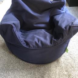 Navy blue bean bag chair, suitable for babies, toddlers, and young children. Machine washable, with zip on underside to empty beans before washing. Kept in good condition from a smoke-free home.