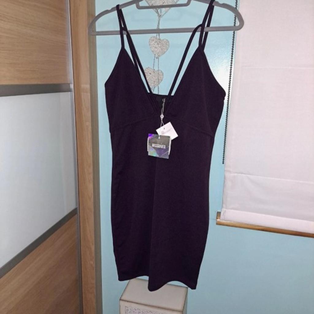 New with tags Missguided dress. This is labelled as a size 14 but I think very small fitting so would be ok for a size 12 or even a size 10. Stretchy material. Dark purple/plum in colour
Collection from Conisbrough or may be able to deliver local
