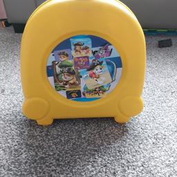 Travel carry potty fantastic for using out and about. Has a cover so contents are sealed tight once inside. Also has a removable tip tray making it very easy to tip contents out. Only a couple of weeks old, my little one hasn't taken to it.

Paw patrol stickers stuck over the top of the original label