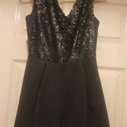 New tagged lovely day sequin top half no sequins on the sides. Flared from the waste down .this dress has been steam cleaned as it has been stored way .real lovely dress .not thin. .size .pet n smoke free home. Size 6