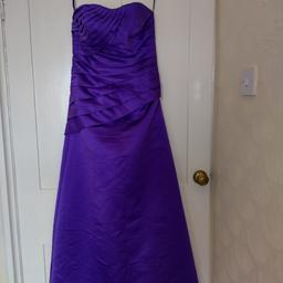Hi I'm selling my lovely Royal Purple Bridesmaid dress with matching bag only worn once at my friend's wedding. Comes from smoke free home looking for £30 ONO