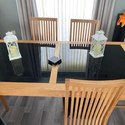 Light oak wood dining table with black glass surface ,
And 6 light oak dining chairs
Excellent condition
From smoke n pet free home
Collection only