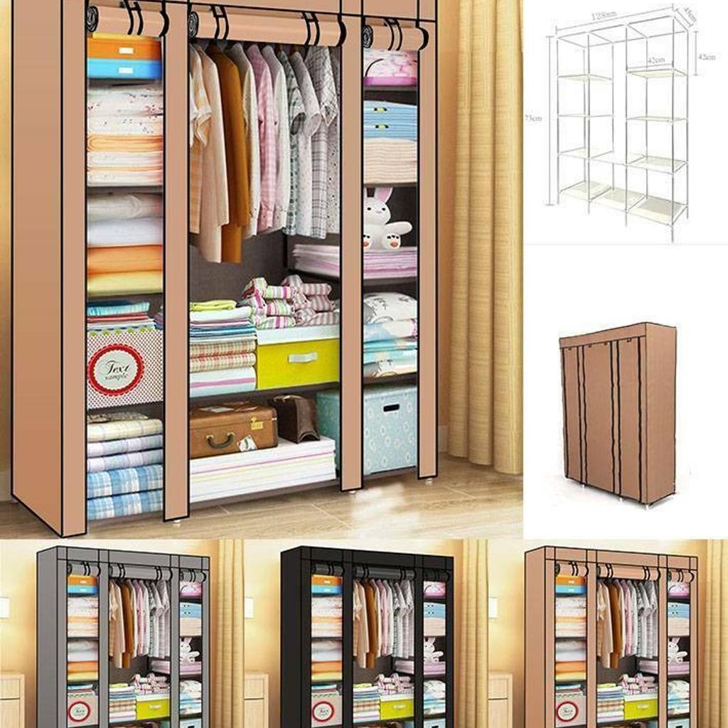 1.Excellent Storage Solution for every household. Made from Thick non-woven fabric.

2.Great Design and Style

3.Large enough for several clothing hanging in.

4.Triple Designing.

Specification:

Size: 128x45x173cm

Age: 21st Century (2000-now)

Features:Flat Pack, With Hanging Rail.

Room:Bedroom

Style:Modern

Type:Canvas Wardrobe

Material:Metal & Fabric

Package Include:

1X Large fabric canvas wardrobe

Please Note:

The colour of the product received may vary in shade slightly as this depends on the resolution of your computer screen.